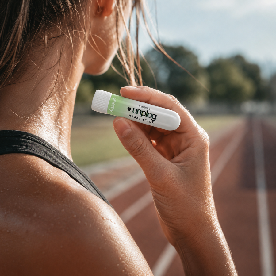 Person using Unplog nasal inhaler